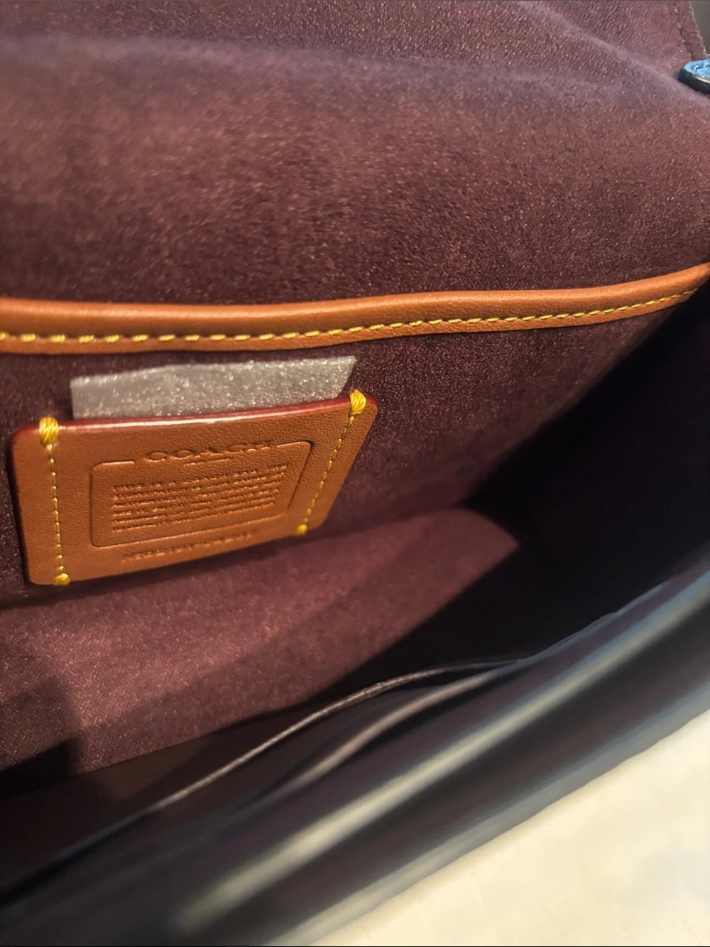 Coach sleek leather